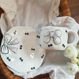 Black Bow Ceramic Coffee Mug with Matching Saucer